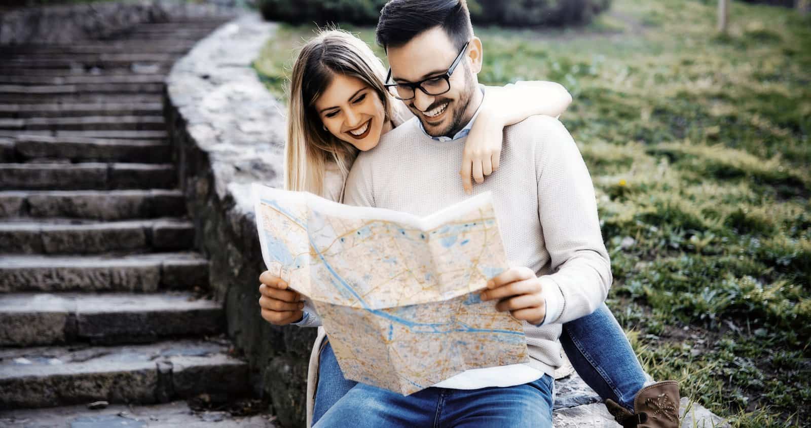 couple looking at a travel map