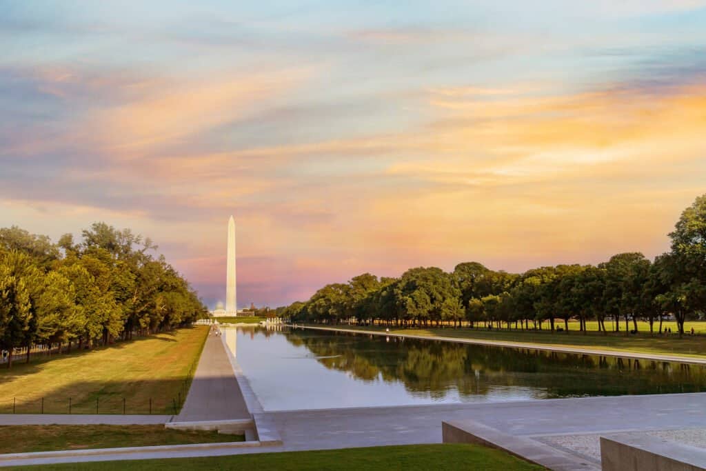 Washington monument reflected on the reflecting pool in nation mall, Washington DC, USA.