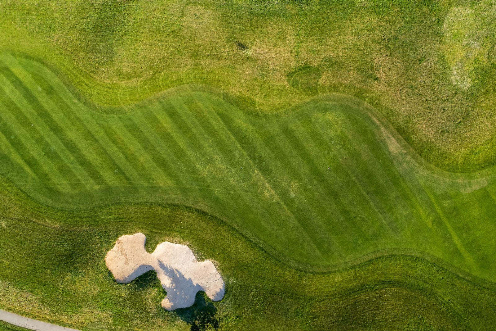 Aerial view of a green golf course